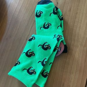 Halloween themed black cat green socks